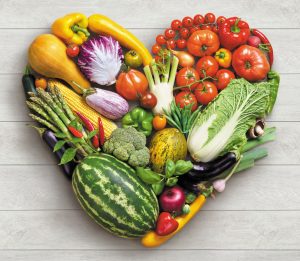Vegetables in the shape of a heart to accompany text about the services of vegan counsellor